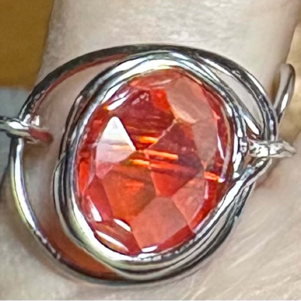 Radiant Silver and Red Gemstone Ring